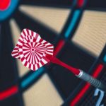 Asymmetrical Board Games - Red and White Dart on Darts Board