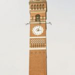 Indie Developers - A tall clock tower with a clock on it