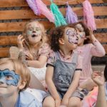 Party Games - Kids Playing on Grass