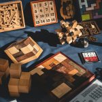 brown-wooden-blocks-on-blue-textile
