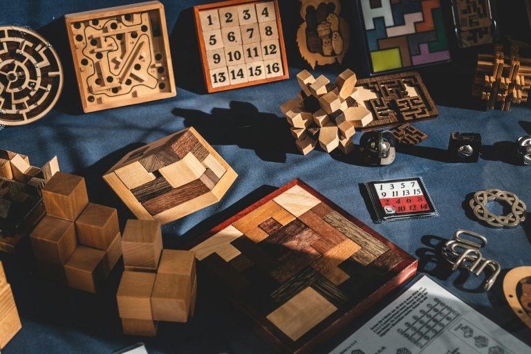 brown-wooden-blocks-on-blue-textile
